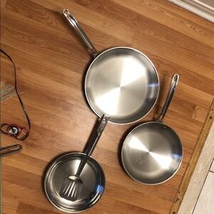 Three Piece Viking and Zwilling Stainless Steel Frying Pan Set with Spatula.